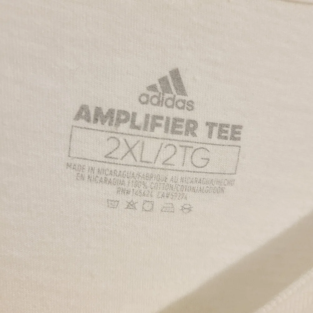 Adidas | Men's White Essential Amplifier Tee With Black Logo (Size 2XL)